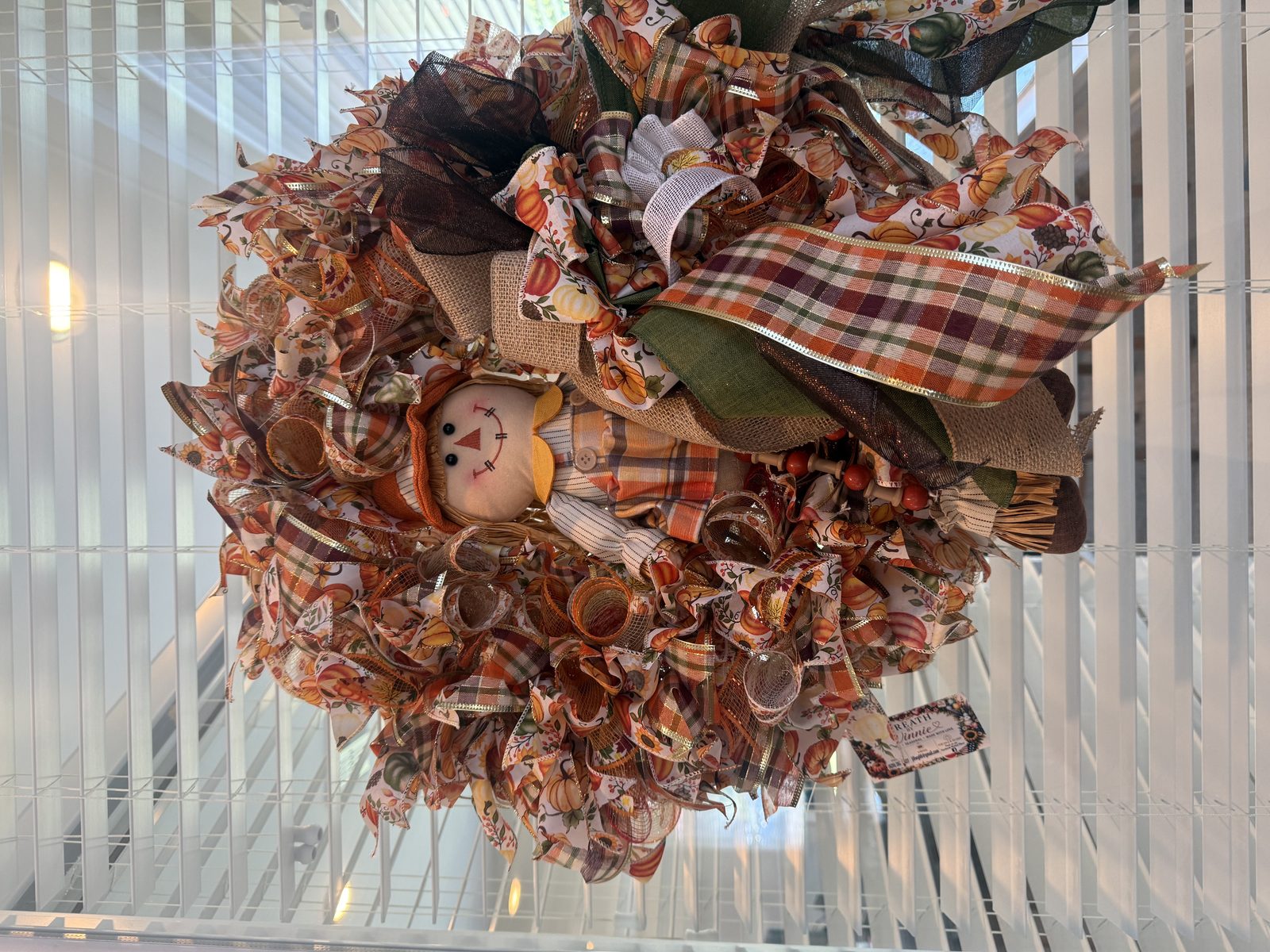Cozy fall wreath with plaid bow